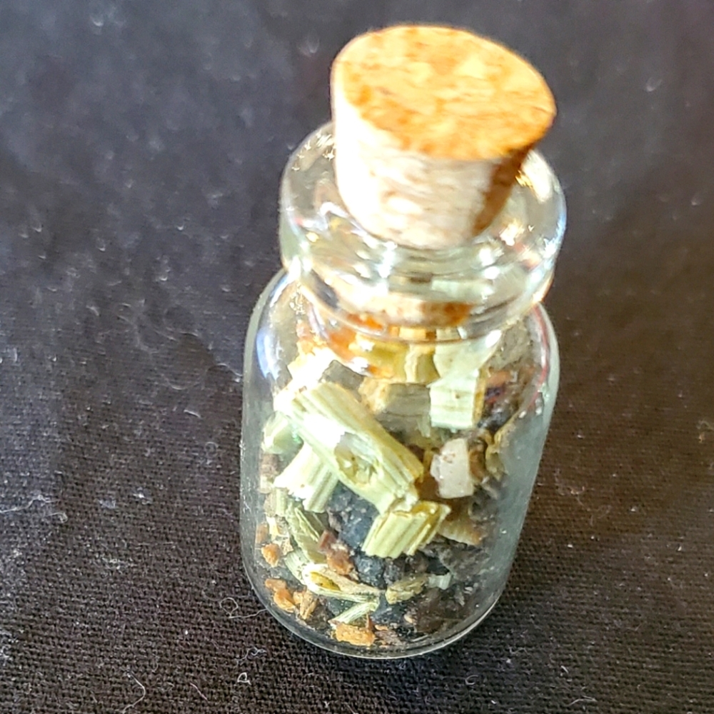 Saturnian spell bottle